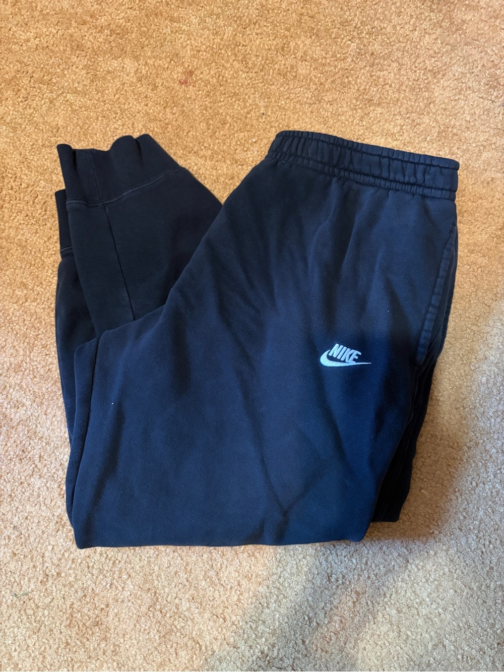 Nike Black Fleece Sweatpants with White Logo Tag